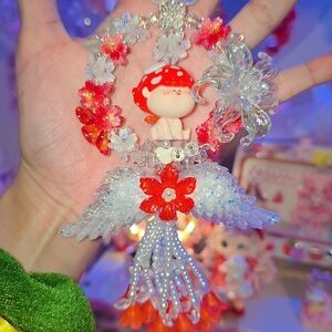 Colorful Angel Ornament with Red Mushroom